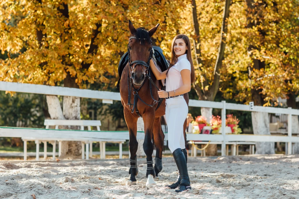 beautiful-girl-with-herbrown-horse-walking-together-autumn-forest